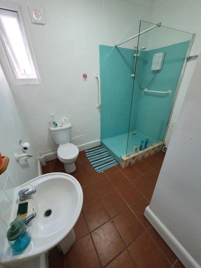 Singer House: Seafront Garden Flat With Parking